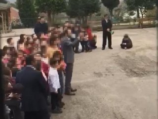 Öğretmenler Gününde ilkokul öğrencisini betona oturttu
